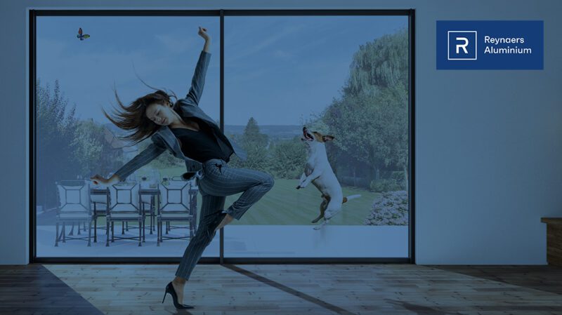 brand image for Reynaers, of a dog jumping up with woman dancing